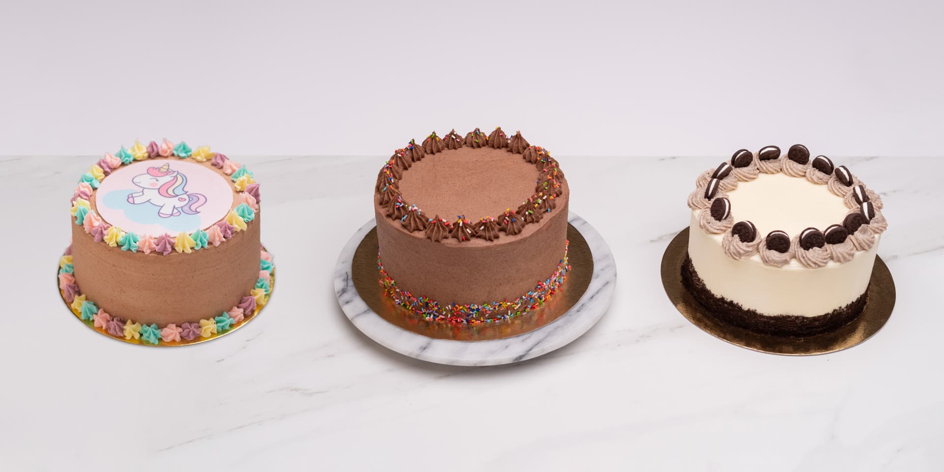 Tres tortas de cumpleaños del curso: unicornio, chocolate y Oreo